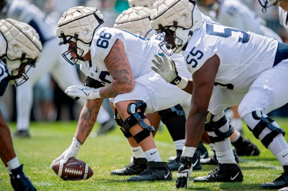 Penn State offensive lineman Nick Dawkins lines up for a play during the Blue-White game on Saturday, April 23, 2022.