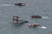 <p>In this photo provided by America’s Cup Event Authority, Emirates Team New Zealand capsizes during an America’s Cup challenger semifinal against Great Britain’s Land Rover BAR on the Great Sound in Bermuda on Tuesday, June 6, 2017. (Gilles Martin-Raget/ACEA via AP) </p>