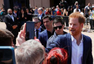 Britain's Prince Harry greets members of the public during a visit at the Sydney Opera House in Sydney, Australia October 16, 2018. REUTERS/Phil Noble