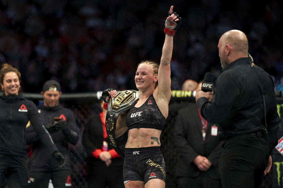 HOUSTON, TEXAS - FEBRUARY 08:  Valentina Shevchenko of Kyrgyzstan celebrates her TKO victory over Katlyn Chookagian in their women's flyweight championship bout during the UFC 247 event at Toyota Center on February 08, 2020 in Houston, Texas. (Photo by Cooper Neill/Zuffa LLC via Getty Images)