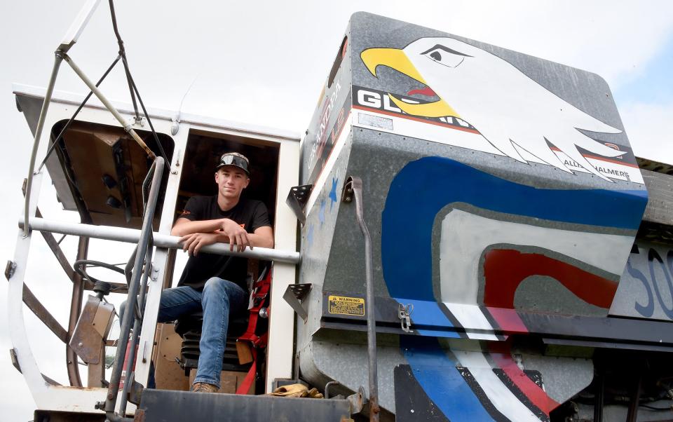 Camden Schmidt painted an eagle and red, white and blue markings on the combine in honor of his grandpa, Navy veteran Robert Kuehnlein.