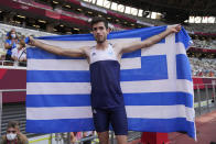 Miltiadis Tentoglou, of Greece, celebrates after winning men's long jump final at the 2020 Summer Olympics, Monday, Aug. 2, 2021, in Tokyo. (AP Photo/Matthias Schrader)