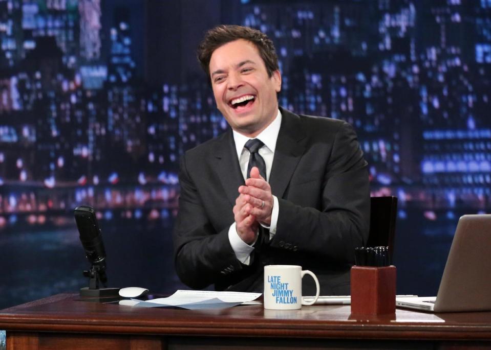 This Feb. 21, 2013 photo released by NBC shows Jimmy Fallon, host of "Late Night with Jimmy Fallon," on the set in New York. Speculation is swirling the network is taking steps to replace the host with Jimmy Fallon next year and move the show from Burbank to New York. NBC confirmed Wednesday, March 20, it's creating a new studio for Fallon in New York, where he hosts "Late Night." But the network did not comment on a report that the digs at its Rockefeller Plaza headquarters may become home to a transplanted, Fallon-hosted "Tonight Show." (AP Photo/NBC, Lloyd Bishop)