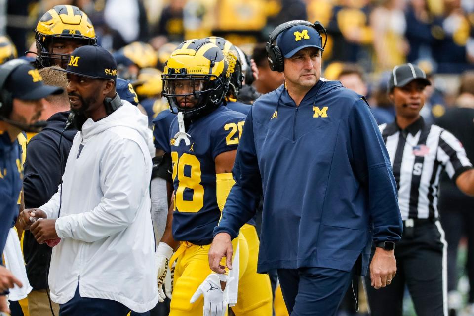 Michigan defensive line coach Mike Elston watches a play against Maryland during the first half at Michigan Stadium in Ann Arbor on Saturday, Sept. 24, 2022.