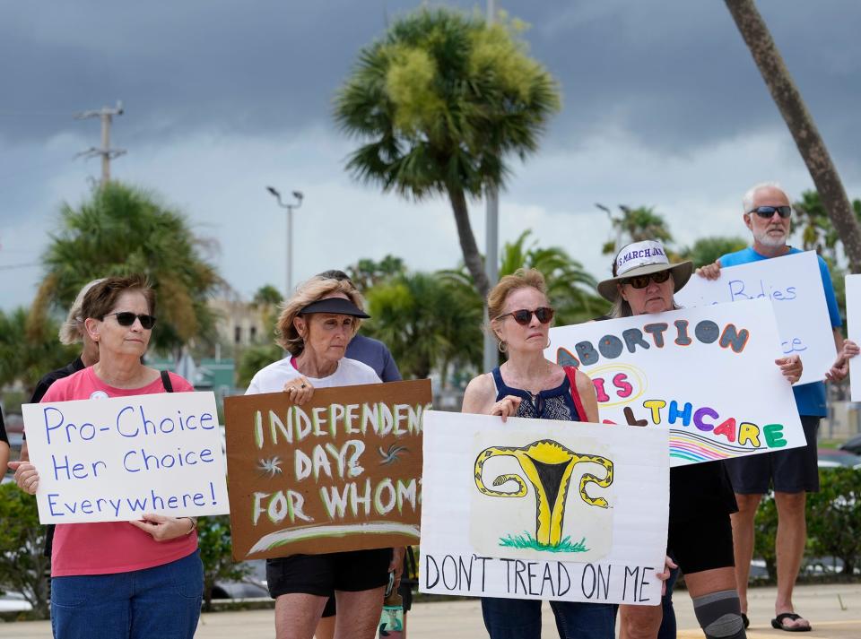 Pro-choice demonstrators protest the Supreme Court's ruling on Roe v Wade on Friday outside the Volusia County Courthouse Annex in Daytona Beach. “We shouldn’t have to be fighting for our rights again,” said Diane Rose, 66, of Daytona Beach. “But the fight will continue until we get our rights as women to have a say over our bodies."