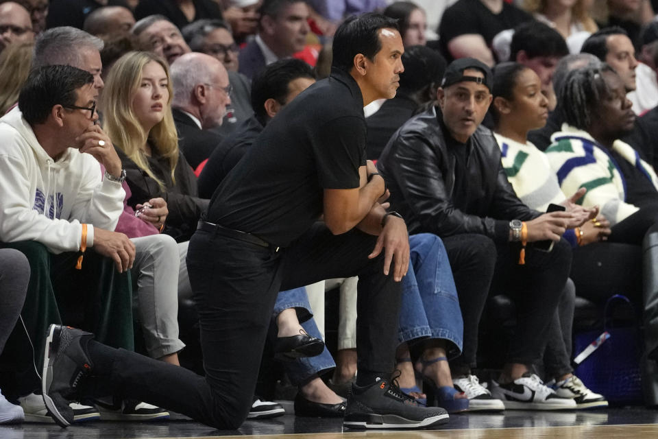 Miami Heat head coach Erik Spoelstra watches from the sideline during the first half of an NBA basketball game against the Philadelphia 76ers, Monday, Dec. 25, 2023, in Miami. (AP Photo/Lynne Sladky)