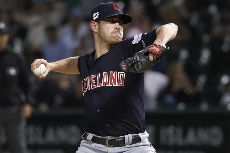 FILE - In this Sept. 25, 2019, file photo, Cleveland Indians starting pitcher Shane Bieber delivers during the first inning of the team's baseball game against the Chicago White Sox in Chicago. (AP Photo/Charles Rex Arbogast, File)