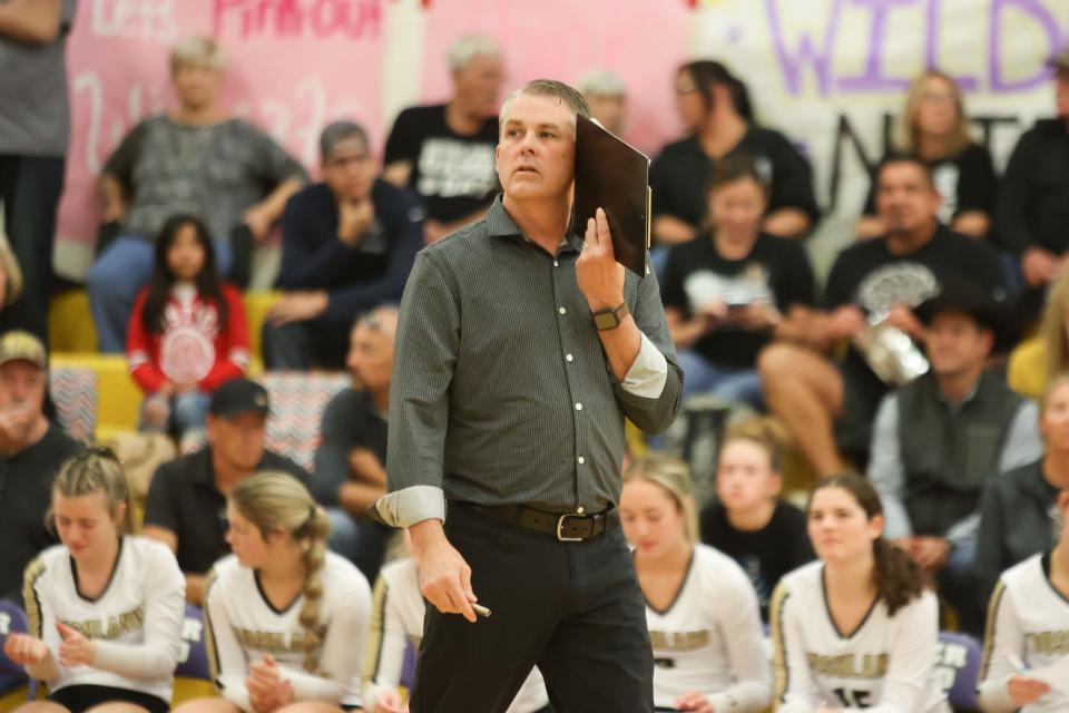 Bushland head coach Jason Culpepper calls a play during a District 1-3A match against River Road, Tuesday, October 25, 2022, at River Road High School.  Bushland won 3-0