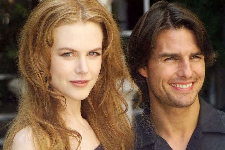 RFILE--Actors Nicole Kidman and her husband Tom Cruise smile during a photocall in Paris in this Sept. 2, 1999, file photo. The 11-year marriage of Cruise and Kidman is on the rocks. 