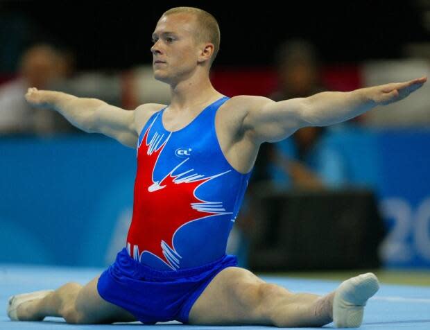 Canada's Kyle Shewfelt, author of a new book bout the life gymnastic, joins Anastasia Bucsis on Player's Own Voice podcast. (Canadian Press - image credit)