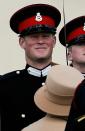 <p>Prince Harry completes officer training. Here, he smiles as he chats with Queen Elizabeth II during the Sovereign's Parade at Sandhurst Military Academy.</p>