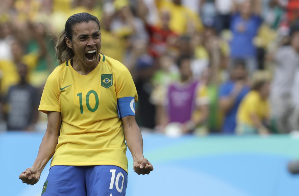 Brazil's Marta celebrates after scoring during the penalty shoot-out during a semi-final match of the women's Olympic football tournament between Brazil and Sweden at the Maracana stadium in Rio de Janeiro Tuesday Aug. 16, 2016.(AP Photo/Natacha Pisarenko)
