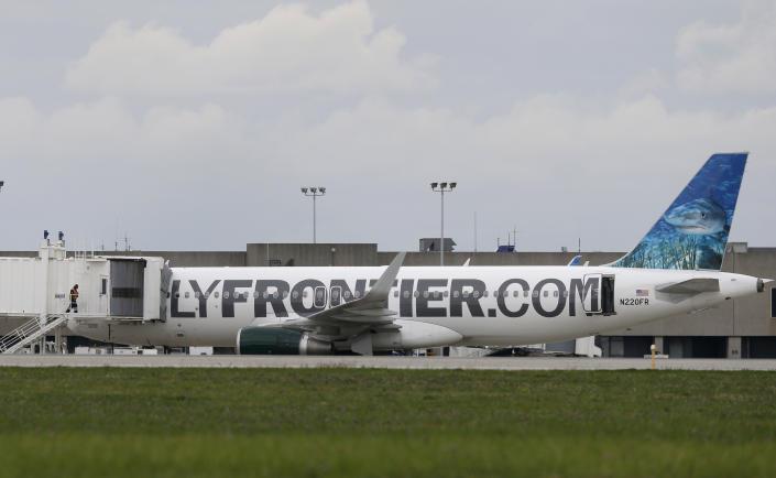 The plane which Amber Vinson was a passenger on was grounded on Wednesday for decontamination. (AP/Tony Dejak)