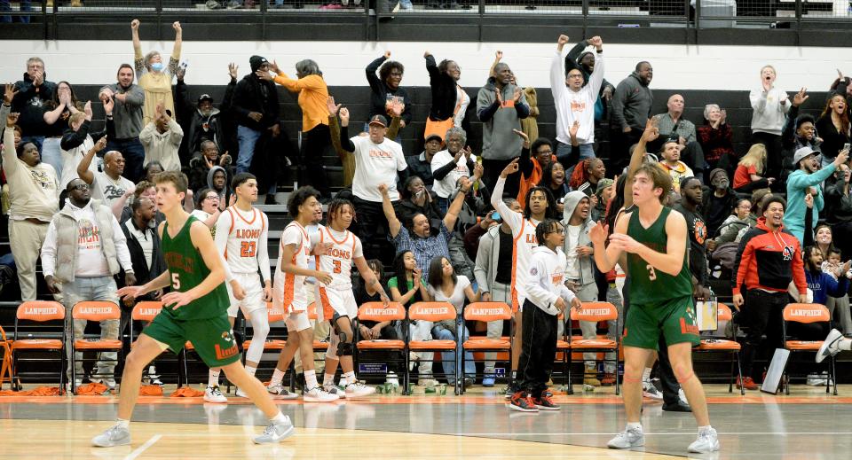 Lanphier fans react when they thought their team had won the game, but it turned out there were still seconds left on the clock. Lincoln ended up winning the game 55-54 in the new Lober-Nika Gymnasium on Friday, January 12, 2024.
