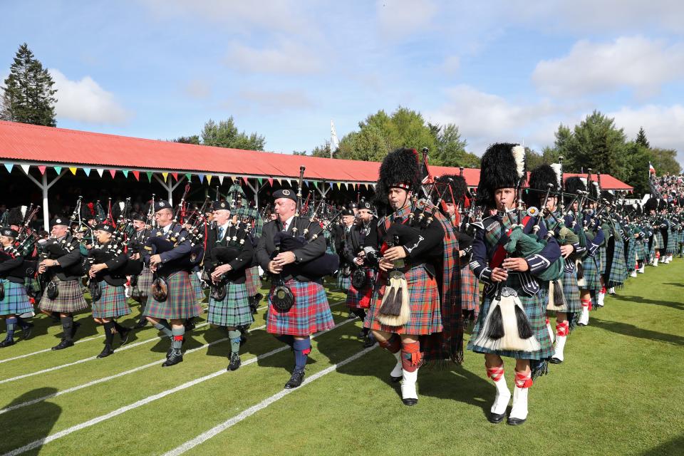 A piped band playing at the 2019 Braemar Highland Games.