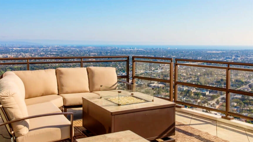 A view of the Los Angeles skyline from a balcony.