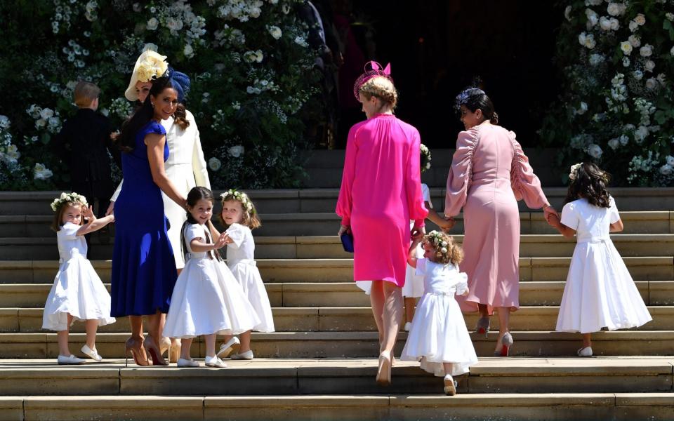 Jessica Mulroney, in blue, at Meghan Markle's wedding to Prince Harry in 2018 - GETTY IMAGES