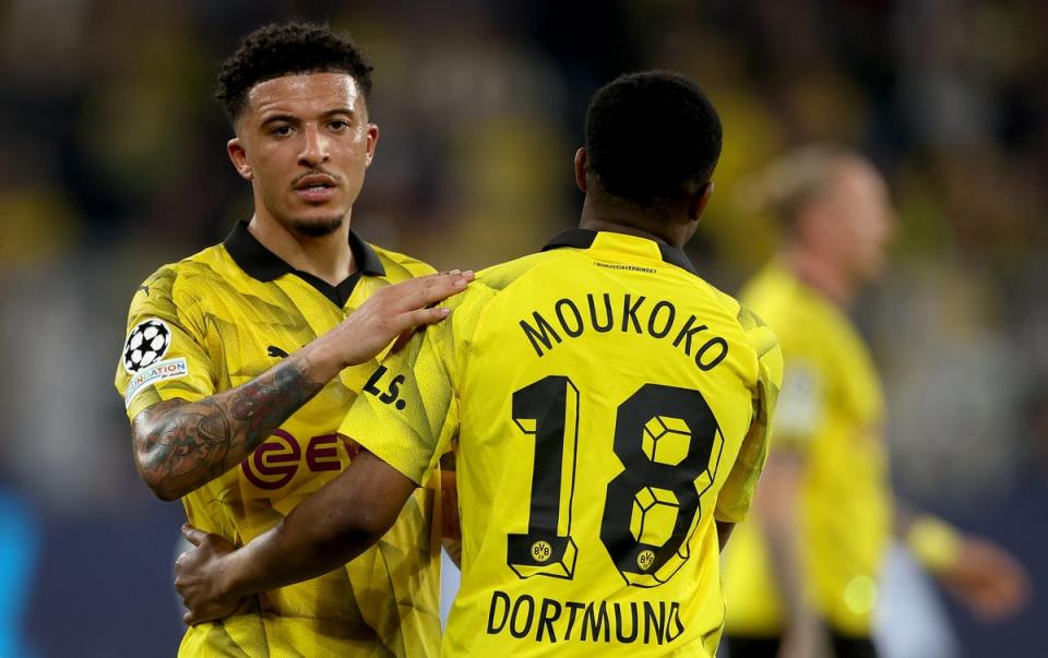 Borussia Dortmund have reinvigorated Jadon Sancho, left (Getty)