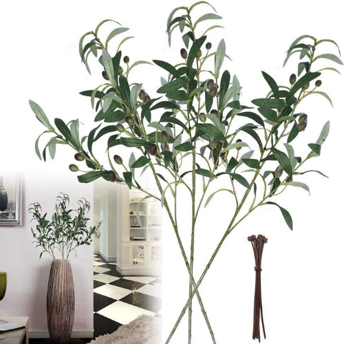 faux olive branch in vase inside a home