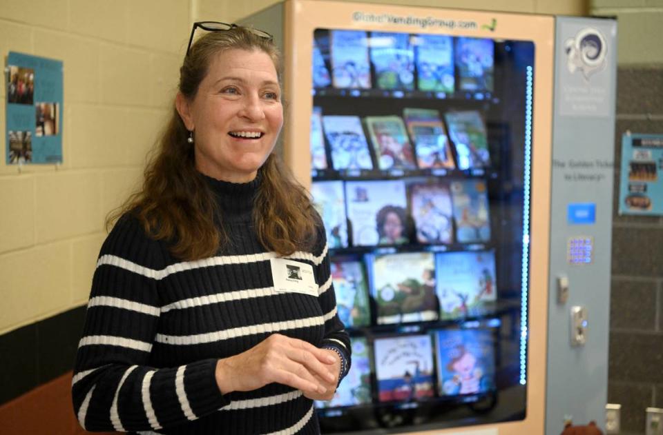 Penny Eifrig talks about the Random Acts of Reading Golden Ticket to Literacy book vending machine was introduced at Centre Hall Elementary on Friday, Feb. 3, 2023.