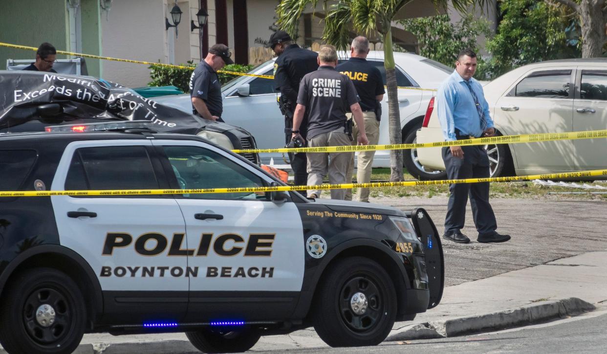Boynton Beach police investigate a fatal shooting at the Cherry Hill Market at 1213 N.W. 4th Street Thursday morning, February 6, 2020. [LANNIS WATERS/palmbeachpost.com]