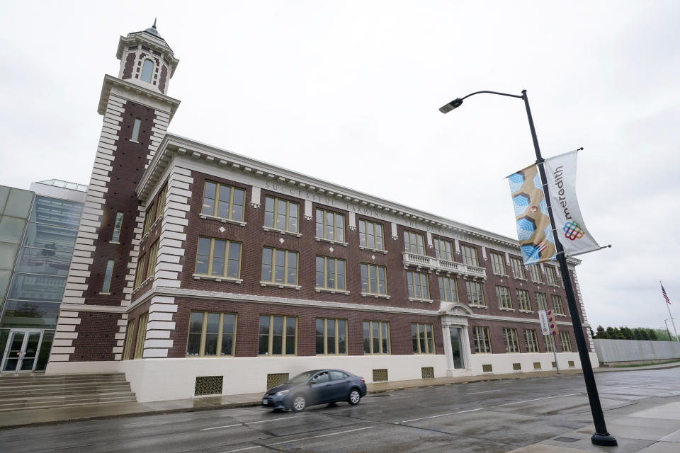 The headquarters of Meredith Corp. is shown, Monday, May 3, 2021, in Des Moines, Iowa. On Monday, the company said it will sell its Local Media Group consisting of 16 television stations to Gray Television Inc. for $2.7 billion in cash and focus on expanding its print and digital magazines business. (AP Photo/Charlie Neibergall)