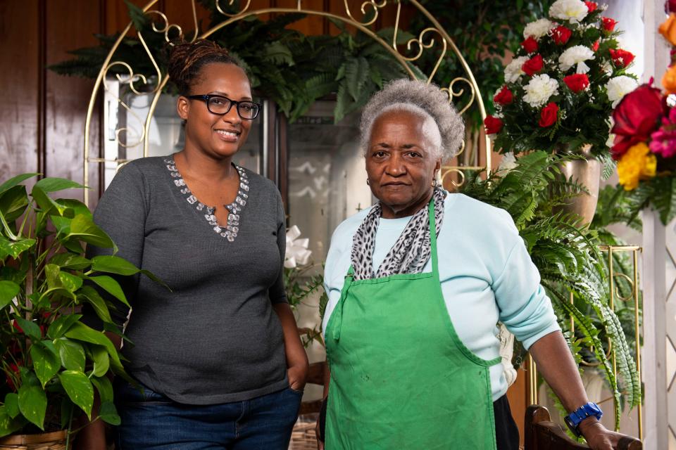 Nikeema Lee, owner of Mahaba Floristry, left, and Pat Agnew, owner of Flowers by Pat, stand together for a portrait inside Agnew's shop on Friday, Jan. 13, 2023. 