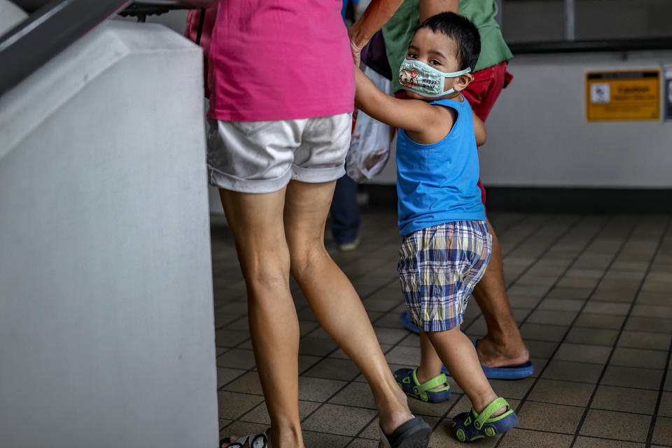 MANILA, PHILIPPINES - JANUARY 31: A child is seen wearing a face mask, as public fear over China's Wuhan Coronavirus grows, on January 31, 2020 in Manila, Philippines. The Philippine government has been heavily criticized after failing to immediately implement travel restrictions from China, the source of a deadly coronavirus that has now killed hundreds and infected thousands more. The World Health Organization (WHO) on Thursday declared the coronavirus a public health emergency of international concern. (Photo by Ezra Acayan/Getty Images)