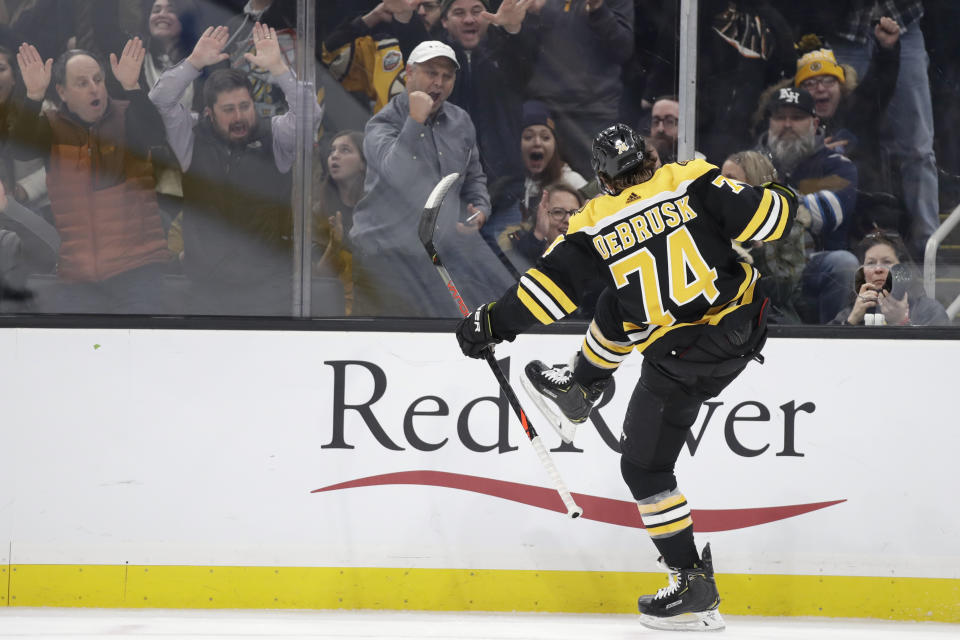 Boston Bruins left wing Jake DeBrusk (74) celebrates his goal against the Winnipeg Jets during the second period of an NHL hockey game Thursday, Jan. 9, 2020, in Boston. The Bruins won 5-4. (AP Photo/Elise Amendola)
