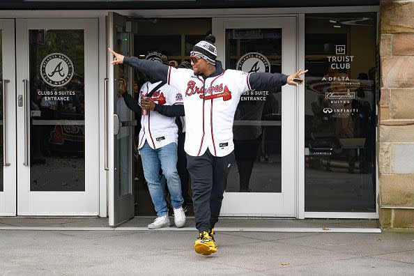 ATLANTA, GA - NOVEMBER 05: Fans cheer for Ronald Acuña Jr. of the Atlanta Braves as he gets on the buses before their World Series Parade at Truist Park on November 5, 2021 in Atlanta, Georgia. The Atlanta Braves won the World Series in six games against the Houston Astros winning their first championship since 1995. (Photo by Megan Varner/Getty Images)