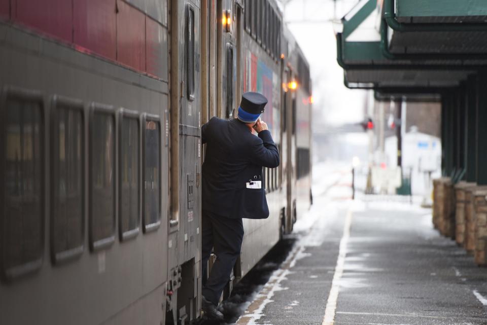 A conductor checks prior to boarding at Radburn Station on Sunday morning in Fair Lawn, NJ on 01/20/19. 