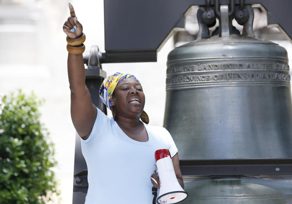 Valencia Robinson with Mississippi In Action, a reproductive justice organization, addresses abortion rights advocates, Tuesday, May 21, 2019, at the Capitol in Jackson, Miss., as they rally to voice their opposition to state legislatures passing abortion bans. (AP Photo/Rogelio V. Solis)