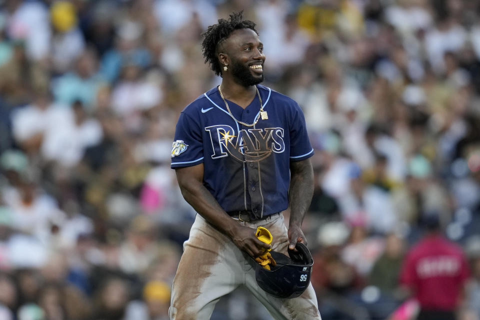 Tampa Bay Rays' Randy Arozarena smiles as he waits for a play review after he was caught stealing second base during the fourth inning of a baseball game against the San Diego Padres, Friday, June 16, 2023, in San Diego. (AP Photo/Gregory Bull)