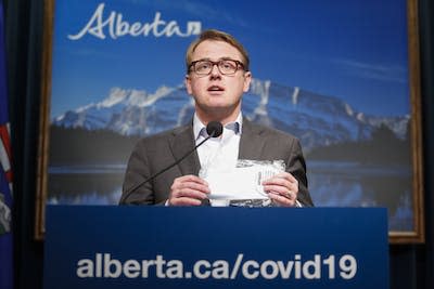Tyler Shandro, Alberta’s health minister at the time, discusses an initiative to distribute non-medical masks to Albertans to prevent the spread of COVID-19 in May 2020. THE CANADIAN PRESS/Jeff McIntosh