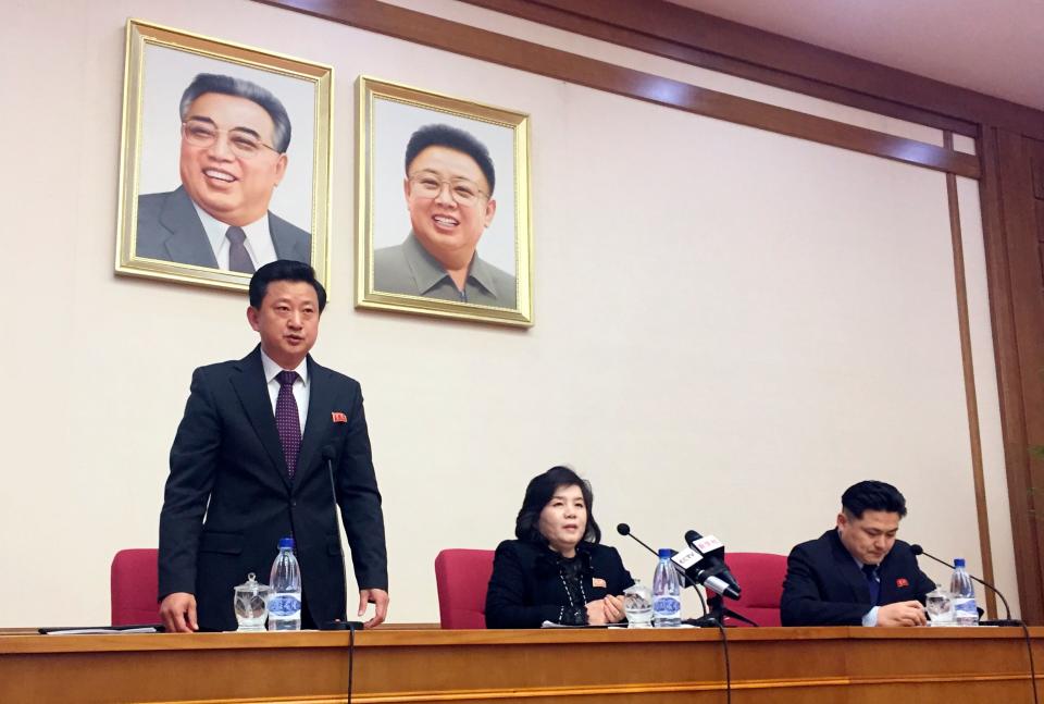 North Korean Vice Foreign Minister Choe Son Hui, center, speaks at a gathering for diplomats in Pyongyang, North Korea on Friday, March 15, 2018. North Korean leader Kim Jong Un will soon make a decision on whether to continue diplomatic talks and maintain the country's moratorium on missile launches and nuclear tests, the senior North Korean official said, noting the U.S. threw away a golden opportunity at the recent summit between their leaders. Interpreter is on Choe's right and the man standing is unidentified vice director of foreign ministry’s North America desk.