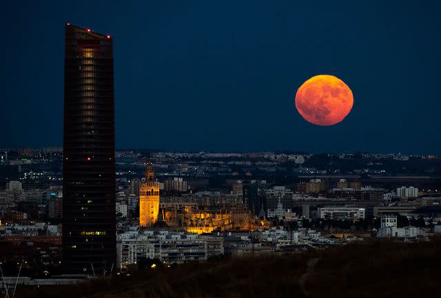 <p>CRISTINA QUICLER/AFP via Getty</p> Rare super blue moon in Seville