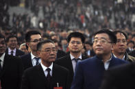 Delegates leave the Great Hall of the People after attending the opening session of the Chinese People's Political Consultative Conference (CPPCC) in Beijing, Sunday, March 3, 2019. Thousands of delegates from around China have gathered in Beijing for the annual session of the country's rubber-stamp legislature and its advisory body. (AP Photo/Andy Wong)