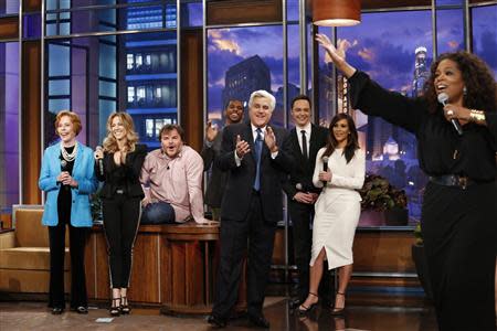 Jay Leno listens to Oprah Winfrey sing on his final night hosting "The Tonight Show with Jay Leno" in Burbank, California in this February 6, 2014 picture provided by NBC. REUTERS/Stacie McChesney/NBC/Handout via Reuters