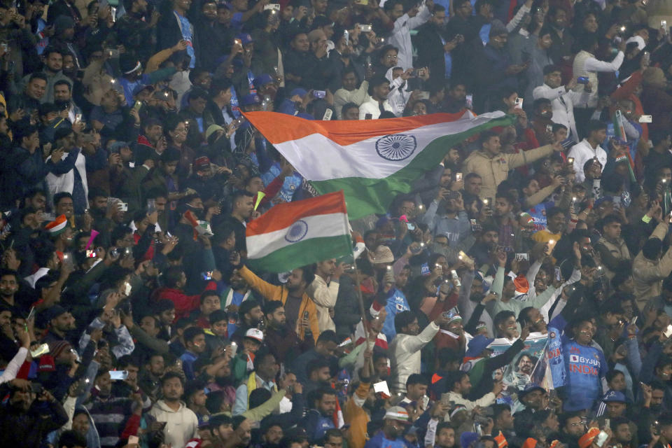 Indian supporters cheer for their team during the second T20 international cricket match between India and New Zealand in Lucknow, India, Sunday, Jan. 29, 2023. (AP Photo/Surjeet Yadav)