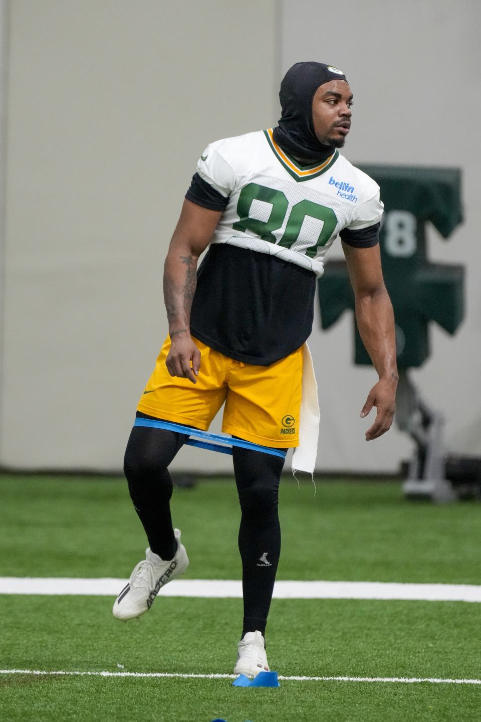 Green Bay Packers' Bo Melton stretches during an NFL football practice session Tuesday, June 4, 2024, in Green Bay, Wis. (AP Photo/Morry Gash)