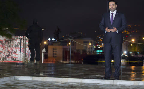 Former Prime Minister of Lebanon Saad Hariri visits the grave of former Prime Minister of Lebanon, Rafik Hariri  - Credit: AFP