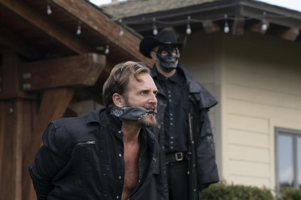 (from left) Dylan Tucker (Josh Lucas) and a Purger in The Forever Purge, directed by Everardo Valerio Gout.