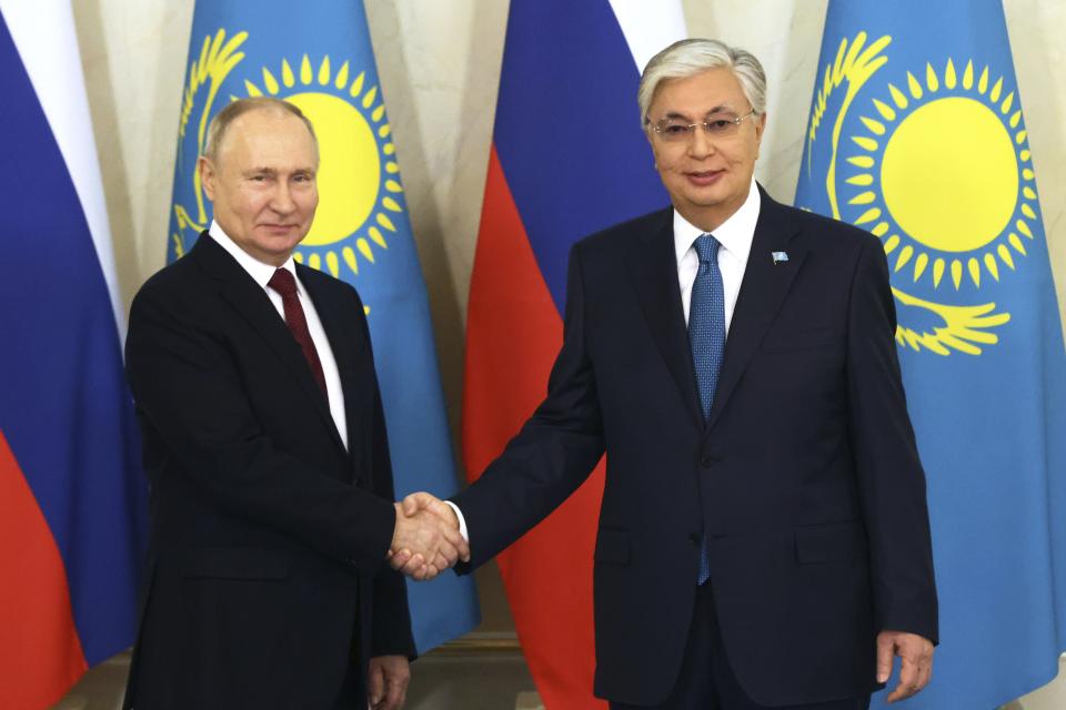 Kazakh President Kassym-Jomart Tokayev, right, and Russian President Vladimir Putin pose for a photo prior to their talks at the Akorda Presidential residence in Astana, Kazakhstan, Thursday, Nov. 9, 2023. (Konstantin Zavrazhin, Sputnik, Kremlin Pool Photo via AP)