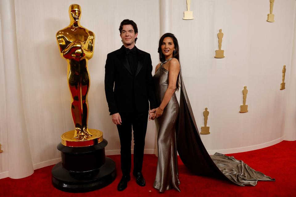 John Mulaney and Olivia Munn attend the Oscars on March 10, 2024.