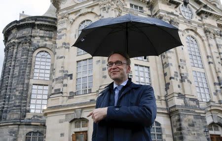 German Bundesbank President Jens Weidmann gestures in front of the Frauenkirche cathedral in Dresden, Germany, May 27, 2015. Dresden hosts the G7 finance ministers and central bankers meeting. REUTERS/Fabrizio Bensch