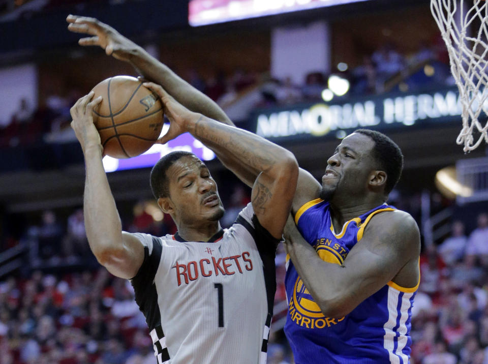 Proof Draymond Green plays defense against the Rockets. (AP)