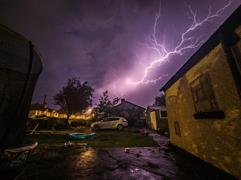 A lightning bolt photographed over Rhyl in Wales (Thomas Davies/SWNS)