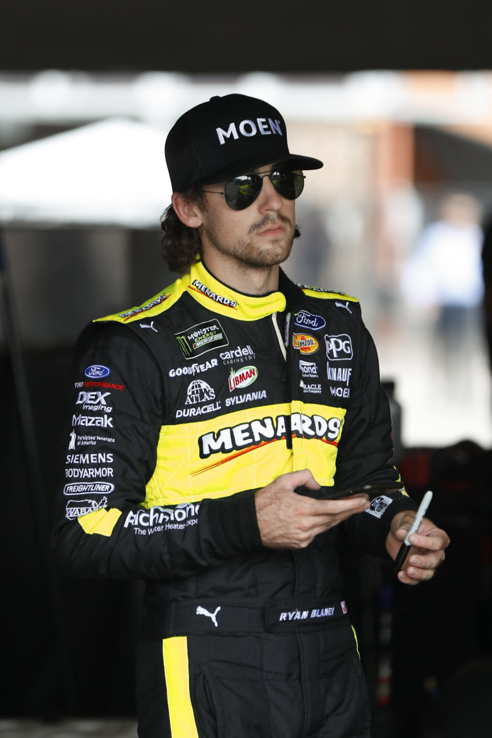 Ryan Blaney watches during practice for a NASCAR Cup Series auto race at Michigan International Speedway in Brooklyn, Mich., Saturday, Aug. 10, 2019. (AP Photo/Paul Sancya)