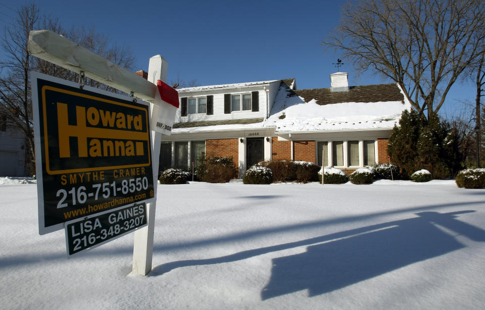 A sale sign sits in front of a home in the Shaker Heights section of Cleveland, Ohio, 25 January 2008. The area is filled with homes for sale or on the auction block. The city of Cleveland is the epicenter of the nation's home foreclosure crisis and is creating bad news for nearby homeowners and cities across the country because they lead to falling property values and increased crime.  AFP PHOTO/Timothy A. CLARY (Photo by Timothy A. CLARY / AFP) (Photo by TIMOTHY A. CLARY/AFP via Getty Images)