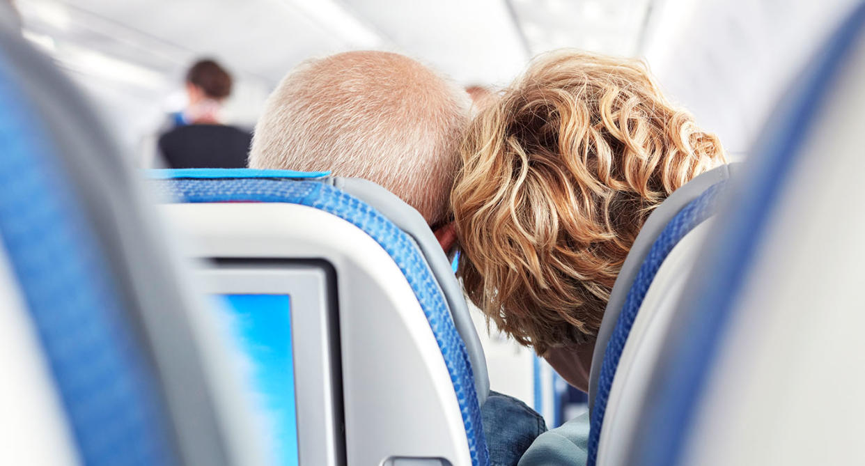 A man, posed by model, has gone viral for a sweet gesture on a plane. [Photo: Getty]